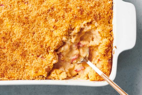 This recipe combines two classic Southern dishes to create something special: Pimento cheese, a spread for sandwiches, crackers and vegetables, meets mac and cheese for a peppery and spicier version of the traditional baked casserole The core ingredients of pimento cheese — sharp yellow Cheddar, pimento peppers and cream cheese — cook into a sauce that’s creamier and tangier than the usual purely cheese base. Pimento Mac And Cheese Recipes, Pimento Cheese Mac And Cheese, Pimento Mac And Cheese, Southern Macaroni And Cheese, Macaroni N Cheese Recipe, Southern Dishes, Thanksgiving Recipes Side Dishes, Baked Casserole, Holiday Goodies