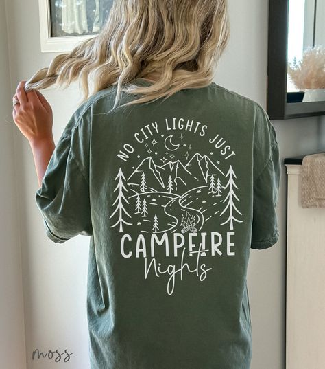 Looking for the perfect camping shirt to celebrate your love for the great outdoors? This camping t-shirt captures the essence of those cherished moments spent under the stars, surrounded by nature. Perfect for family camping trips or a camp-themed bachelorette party, this camper tee will quickly become your favorite.  👉 ABOUT No City Lights Just Camp Fire Nights Comfort Colors® 1717 Shirt - 100% Airlume combed and ringspun cotton - Soft cotton and quality print make users fall in love with it Family Camping Shirts Ideas, Camping Shirt Designs, Camping Tshirt Design, Camping T Shirts Ideas, Camp Shirt Ideas, Camping Shirt Ideas, Camping Tshirt Ideas, Camp Tshirt Designs, Sisterhood Retreat