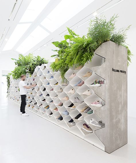 FLIP ZIEDSES DES PLANTES design studio - FILLING PIECES. tropical sneaker landscape. Metal cabinets combined with concrete and plants Shoe Store Design, Filling Pieces, Modular Walls, Exhibition Stand Design, Geometric Pattern Design, Retail Design Blog, Store Design Interior, Store Interior, Exhibition Stand