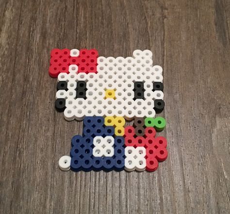 Perler Beads Hello Kitty Hello Kitty Perler Beads Easy, Hello Kitty Melting Beads, Hello Kitty Iron Beads, Perler Beads Ideas Hello Kitty, Hello Kitty Pearl Beads, Hello Kitty Melty Beads, Perler Sanrio, Hello Kitty Fuse Beads, Perler Bead Patterns Hello Kitty