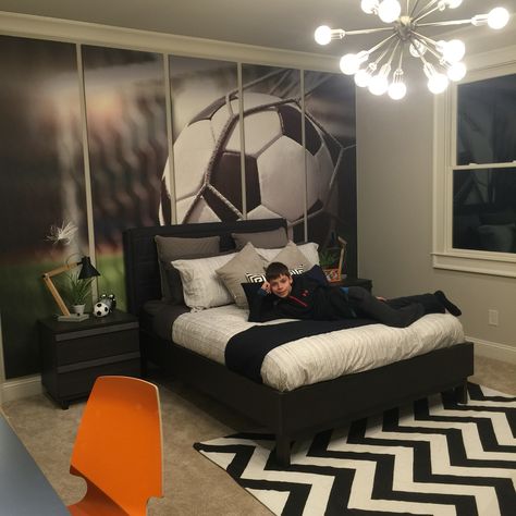 Pre-teen boy, soccer enthusiast bedroom.  #preteenbedroom #soccer #bedroom… Soccer Inspired Bedroom, Teen Boy Soccer Bedroom, Boys Football Bedroom Ideas, Soccer Bedroom Ideas, Orange Mural, Soccer Themed Bedroom, Soccer Bedroom, Football Room