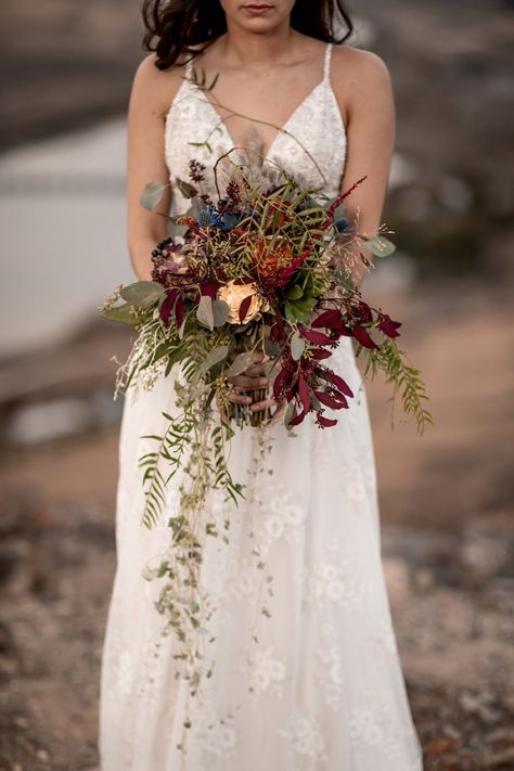 Desert Wedding Bouquet - An Egyptian Princess Wedding Inspiration #desertweddingbouquet #idahowedding #egyptianprincesswedding #egyptianinsoiredwedding #exoticweddingbouquet #rusticfloralweddingbouquet #rusticweddingbouquet #burgundyweddingbouquet #desertwedding #camelinwedding Desert Wedding Bouquet, Desert Bouquet, Egyptian Princess, Exotic Wedding, Flowers And Greenery, Rustic Wedding Bouquet, Aline Wedding Dress, Curvy Bride, Boho Wedding Inspiration