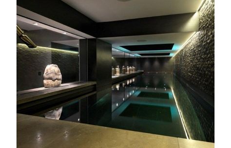 Amazing Indoor pool, black and stone walls, lights. Underground Swimming Pool, Indoor Swimming Pool Design, Moderne Pools, Indoor Pool Design, Piscina Interior, Indoor Pools, Luxury Swimming Pools, Indoor Swimming Pool, Swimming Pool House