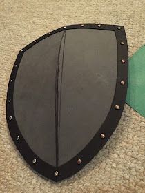 Diy Knight Costume, Medieval Costume Diy, Eva Foam Armor, Medieval Crafts, Large Puzzle Pieces, Foam Armor, Medieval Shields, Knight Shield, Kids Homemade