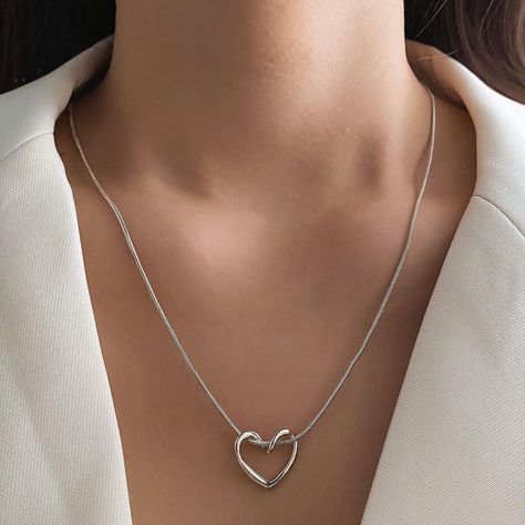 Hollow Heart Necklace “Express your love with our Niche Hollow Heart Necklace. A delicate addition to any outfit. Get yours now! #JewelryLove #HeartNecklace https://parkercreativeconcepts.com/product/niche-hollow-heart-necklace-for-women/ Pendant Necklace Aesthetic, Snake Bones, Necklace Aesthetic, Y2k Accessories, Hollow Heart, Mens Jewelry Necklace, Estilo Hip Hop, Unique Necklace, Teardrop Necklace