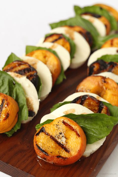 Grilled Peach Caprese Salad with Easy Key Lime Vinaigrette | Florida flavor inspired idea with homemade dressing. Made with a secret ingredient, FL peaches! #Recipe #Salad #HealthyRecipe Grilled Peach Caprese Salad, Grilled Peach Appetizer, Peach Caprese Skewers, Peach Appetizer, Peach Caprese Salad, Peach Caprese, House Concert, Caprese Salad Recipe, Peach Recipes