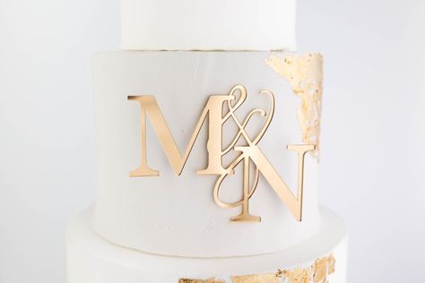 "Celebrate your big day in style with this beautiful laser-cut acrylic cake charm!  Perfect for Wedding or Anniversary Cakes!  *Listing photo is an 5\" W on an 8\" W cake* - D E T A I L S - * Listing is for a cake charm of 2 letters with an \"&\" symbol connecting them * Size is measured by width in inches * Cut from 1/8\" thick acrylic * Easily sticks on to cake with a dab of icing to the back  - O R D E R I N G - 1. Choose your desired color in the first drop down menu 2. Choose the size you w Gold Wedding Cake Topper Initials, Wedding Cake Topper Gold, Wedding Cake Topper Ideas, Cake Topper Wedding, Wedding Cake Gold Leaf, Wedding Cake Toppers Letters, Wedding Cake With Initials, Cake Topper Wedding Monogram, Letter Cake Toppers