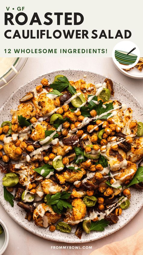 This Roasted Cauliflower Salad is influenced by the vibrant flavors of the Mediterranean. Oven-roasted cauliflower, spiced chickpeas, and sweet and tangy fruits combined into a warming side or appetizer. Vegan, Gluten-Free. Appetizer Vegan, Roasted Cauliflower Salad, Oven Roasted Cauliflower, Spiced Chickpeas, Warm Salad, Crispy Chickpeas, Cauliflower Salad, Best Salad Recipes, Chickpea Recipes