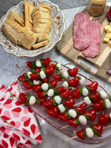 Caprese skewers in shape of hearts Heart Shaped Caprese Skewers, Heart Tomato Skewers, Caprese On A Stick, Valentines Themed Food Dinner Parties, Valentines Caprese, Heart Caprese, Valentines Appetizers, Valentines Charcuterie Board, Prom Food