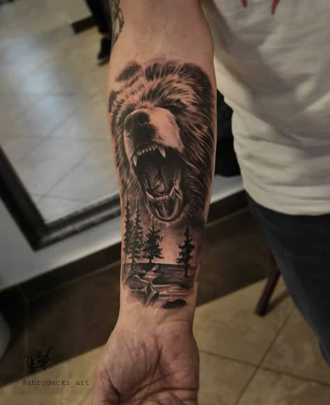 Top 47+ Best Black Bear Tattoo Ideas - [2021 Inspiration Guide] Men Bear Tattoo Ideas, Men Bear Tattoos, Grizzly Bear Forearm Tattoo, Tattoo Ideas For Men Animals, Men’s Bear Tattoo, Bear Realism Tattoo, Animal Arm Tattoo Men, Bear Bicep Tattoo, Bear Side Profile Tattoo