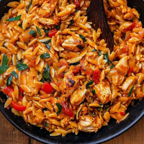 Discover our mouthwatering Cajun chicken orzo recipe - the perfect blend of spicy, creamy, and satisfying. Learn how to make this 30-minute meal Sundried Tomato Chicken Orzo, Chicken Orzo With Sundried Tomato, Cajun Chicken Orzo Recipes, Cajun Dirty Orzo, Chicken And Orzo Recipes, Cajun Chicken Orzo, Spicy Cajun Chicken, Chicken Orzo Skillet With Sun-dried Tomatoes, Apple Cider Sangria Recipe