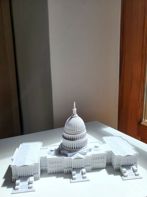 🏛️ US Capitol Model: Discover the exquisite craftsmanship of this highly detailed scale model of the US Capitol. Perfect for history buffs and architectural enthusiasts alike, this precision 3D printed replica brings a piece of Washington, D.C., right to your home or office.

One of the most important landmarks in the world, this model of the US Capitol in Washington DC, USA, will add grandeur to your home/office decor. Us Capitol, Travel Souvenirs, Home Office Decor, Art Object, Scale Models, Office Decor, Architecture