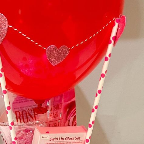 Rachael Clark on Instagram: "@dollartree Valentine’s Day Hot Air Balloon Basket! . . . #diy #diygift #dollartreediy #dollartreefinds #valentinesday #valentinesdaygift #valentinesdaygiftideas #valentinesdaybasket" Valentines Hot Air Balloon Basket, Hot Air Balloon Valentines Boxes, Balloon Basket Diy, Hot Air Balloon Gift Basket, Hot Air Balloon Basket, Valentines Baskets, Holidays Decorations, Balloon Basket, Valentine Gift Baskets