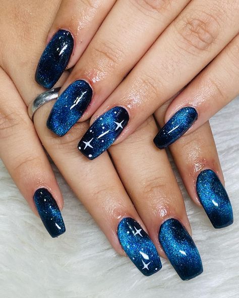 Reaching for the stars with these galaxy nails! 🌌✨✨ Who needs a telescope when your nails can take you to space?😅😇 . . . . #ahmedabadnailstudio #bridalnails #nails #ahmedabad #beauty #instagram #treandynails #nailsbeutyworld #maninagar #gellpolish #freehandnailart #nailsfashion #cromenailart #nailartis #shortnails #nailswag #trending #nailstrend #temporarynailextention #nailsbeuty #acrylicnailextention #nailextention #naturalnails #nailexpert #maninagarnailstudio #clientdiaries #ahmedabadunis... Blue Starry Nails, Space Nails Galaxy, Starry Nails, Nails Galaxy, Space Nails, Galaxy Nails, Reaching For The Stars, Nail Studio, Blue Beach