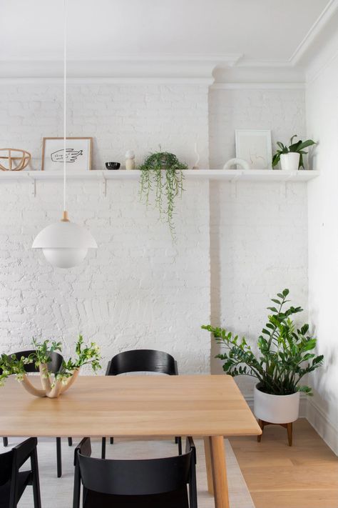 This Brooklyn Home Renovation Was Actually Makeunder | Architectural Digest White Brick Wall Decor, White Brick Interior, White Brick Wall Interior, Brick Table, White Brick Wall, Street Townhouse, Dining Room Shelves, Slate Wall, Turquoise Walls