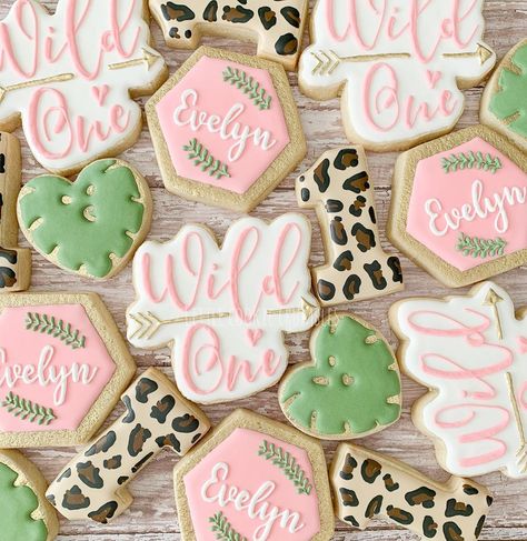 Little Cookie Crumbles on Instagram: “Happy birthday to a wild one!🌱💗 . . . #sugarcookie #sugarcookies #royalicing #royalicingcookies #decoratedcookies #littlecookiecrumbles…” First Birthday Cookies, Wild Birthday Party, 1st Birthday Party For Girls, Girls Party Decorations, Twins 1st Birthdays, One Year Birthday, Wild One Birthday, Wild One Birthday Party