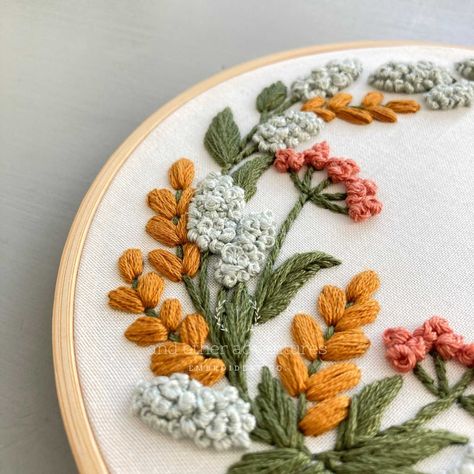 SKILL LEVEL: Beginner COLLECTION: Kensington This Fall floral embroidery is a statement piece that celebrate those amber colors of summer fading into fall. This is a great design that is very forgiving and could even be customized by adding in your own text in the middle of the wreath. This listing is for the KENSINGTON - Amber Hand Embroidery KIT that includes the following: Pre-printed cotton fabric 6-inch embroidery hoop Full skeins of DMC embroidery floss Embroidery Needle A stitch guide Onl Fall Flower Embroidery, Autumn Leaves Embroidery, Embroidery Hacks, Embroidery Leaves, Fall Embroidery, Colors Of Summer, Easy Crafts To Sell, Design For Beginners, Beaded Flowers Patterns