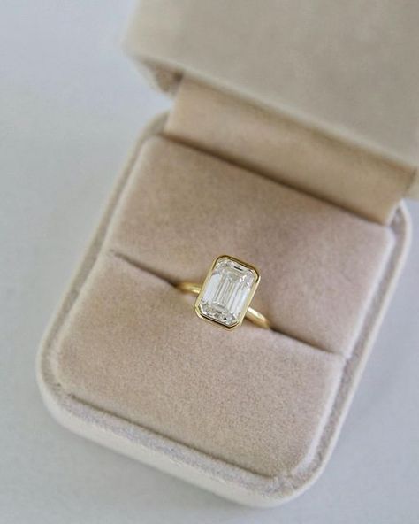 LeiL Jewellery on Instagram: "Our Signature Bezel-Set Engagement ring featuring a stunning 3ct Emerald cut lab-grown diamond.   Discover yours online or book an appointment via link in bio.   #LeiLSignatureSolitaire" Emerald Engagement Ring With Bezel, Emerald Engagement Ring Bezel Set, Oval Cut Bezel Engagement Ring, Emerald Bezel Engagement Ring With Band, Half Bezel Emerald Cut Engagement Ring, Emerald Cut Bezel Set Engagement Ring, Bezel Emerald Ring, Bezel Set Engagement Ring Emerald, Bezel Engagement Ring Oval