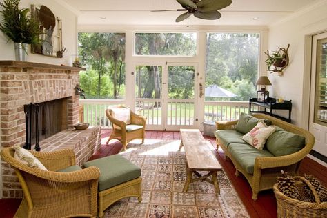 Cozy sunroom with brick fireplace and wicker furniture Indoor Sunroom Furniture, Sunroom With Fireplace, Indoor Sunroom, Sun Crown, Small Sunroom, White Wall Paint, Interior Brick, Sunroom Furniture, Sunroom Addition