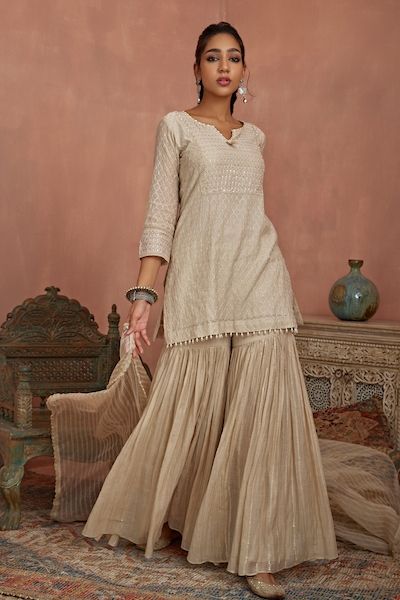 Buy Cream Chanderi Printed Gota Round Embroidered Kurta With Long Inner For Women by Peenacolada Online at Aza Fashions. Short Kurti With Sharara Designs, Sharara Models, Kurti With Gharara, Simple Suits, Short Kurti Designs, Gharara Designs, Sharara Designs, Kurtis Tops, Kurti Style