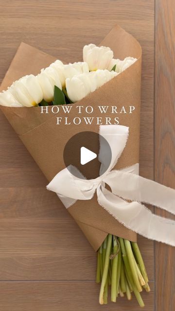 THE SUFFOLK NEST Ashlee Jane on Instagram: "How to easily wrap flowers 🤍 One to save for when you gift flowers to a loved one. #wrappingflowers #whiteflowers #tulipseason #springblooms #springflowers #tulips #tuliplove #wrapping #diywrapping #giftwrapping #giftwrap #giftwrappingideas #giftwrappingskills" Flowers Wrapped In Tissue Paper, How To Give Flowers As A Gift, Few Flower Bouquet, Spring Gift Wrapping Ideas, Craft Paper Flower Wrapping, How To Wrap Flowers Bouquet Gift Ideas, Wrapping Flowers With Paper, Easy Way To Wrap Flowers, How To Wrap Store Bought Flowers