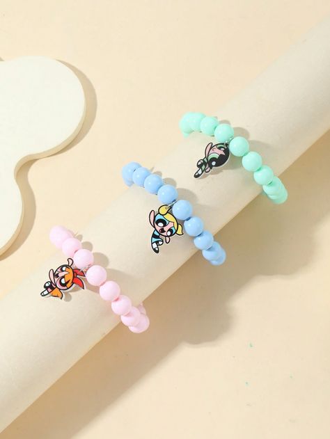 The Powerpuff Girls | ROMWE 3 Pieces Cartoon Pendant Beaded BraceletI discovered amazing products on SHEIN.com, come check them out! Hello Kitty Y2k, The Powerpuff Girls, The Powerpuff, Puff Girl, Watches Women Fashion, Powerpuff Girls, Kids Jewelry, Pendant Bracelet, Oil Control Products