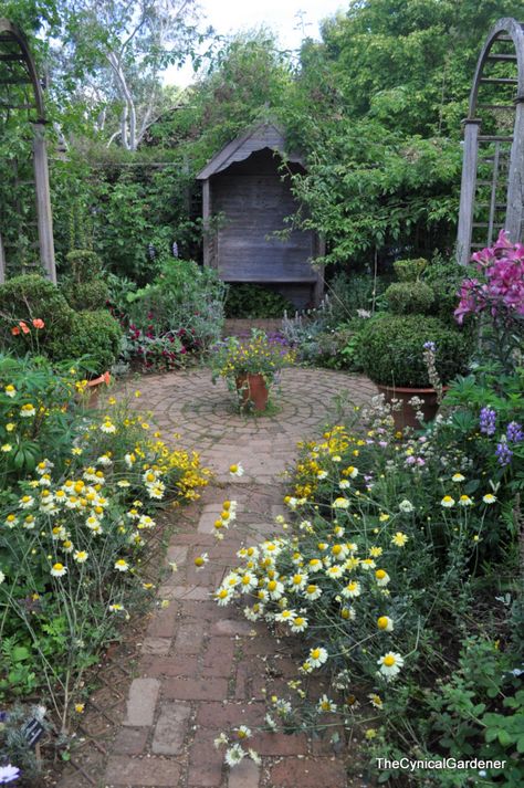 The Artisan's Cottage Garden... looooove the garden path ending in circular area and of course the whole incredible garden setting!!!!