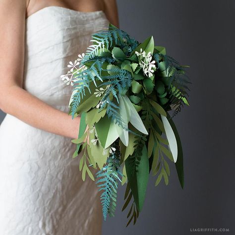 These paper leaves are a fun twist on greenery bouquets. Paper Greenery, Paper Wedding Flowers, Boxwood Wreath Decor, Paper Bouquet Wedding, Flowers At Home, Paper Succulents, Greenery Wedding Bouquet, Instead Of Flowers, Greenery Bouquet