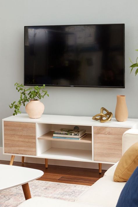 7 Clever Ways to Hide TV Cords Mounted Tv Cable Management, How To Cover Tv Cords On The Wall, Tv Cords Hide Ideas, Hide Fire Alarm On Wall, Hiding Cords Mounted Tv, Cord Hiding Ideas Mounted Tv, Hidden Tv Cables, How To Hide Tv Boxes And Cords, How To Hide Tv Cords Above Fireplace