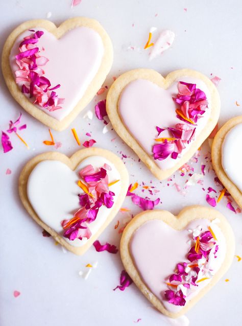 I’ve decided that the only thing better than actually receiving flowers, is eating them! So for Valentine’s Day, I set out to make a lemony sugar cookie, coated with just a hint of pink icing and decorated with a sprinkle of vibrant, edible flowers!  The result is almost too beautiful to e Receiving Flowers, Edible Flowers Recipes, Best Sugar Cookie Recipe, Lemon Sugar Cookies, Chewy Sugar Cookies, Pink Icing, Shaped Cookies, Heart Shaped Cookies, Best Sugar Cookies