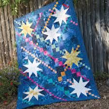 Whitehorse Sky: Capture the glorious spectacle of the northern lights in this scrappy wall quilt | Quilting Daily Night Sky Quilt, Sky Quilt Pattern, Mccalls Quilting, Sky Quilt, Quilt Pattern Download, Keepsake Quilting, Quilt Magazine, Baby Quilt Patterns, Star Quilt Blocks