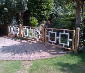 Classic Ponds - Pond Building - Pond Maintenance - Koi and Pond Products Pond Fence, Private Fence Ideas, Pond With Bridge, Garden Pond With Bridge, Brick Koi Pond, Bridge Over Pond, Japanese Fence, Modern Japanese Garden, Koi Fish Pond With Bridge