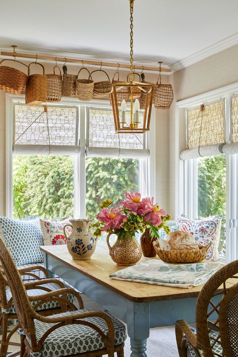 A whimsical breakfast nook design by @stephperezstudio featuring vintage hanging baskets, a rattan light fixture from @visualcomfort, an antique English farmhouse table and rattan dining chairs. Perfect for an English cottage inspired kitchen. Visit www.stephanieperez.com to work with us. Cottage Style Bedrooms, Cottagecore Home, Cottagecore Decor, Cottage Interiors, Cozy Kitchen, Dining Nook, Design Del Prodotto, Cottage Decor, Cottage Style