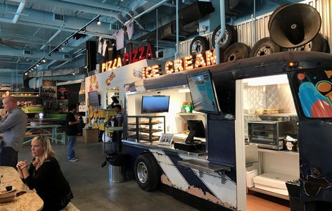 The “Instagrammable” Seventh Street Truck Park in St. Paul has a central bar and six food trucks. Indoor Food Truck, Food Truck Park, Warehouse Renovation, Street Truck, Truck Restaurant, Pork Carnitas Tacos, Street Food Design, Giant Ice Cream, Mobile Cafe