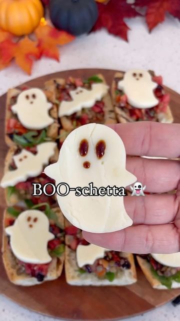 @thefeedfeed on Instagram: "@thesnowyblonde’s BOO-schetta is an easy appetizer recipe that is perfect for holiday parties 👻🎃

Get the details below and keep tagging #feedfeed for a chance to be featured.

HOW TO:
1. Slice french bread into 3-inch slices. Slice in half again.
2. Arrange on a baking sheet. Scoop out some of the bread if desired, and brush the top of the bread with olive oil.
3. Bake at 450F for 7 minutes.
4. Meanwhile, in a bowl mix together a container of Trader Joes bruschetta sauce and a bag of steamed lentils. Set aside.
5. Using halloween themed cookie cutters, slice mozzarella into spooky shapes.
6. Top the bread slices with arugula, the bruschetta mixture, balsamic glaze, and mozzarella cheese. 
7. Optional: use additional balsamic glaze to draw faces onto the chees Spooky Bruschetta, Ghost Bruschetta, Boo Schetta, Bruschetta Sauce, Steamed Lentils, Draw Faces, Balsamic Glaze, 7 Minutes, Halloween Snacks