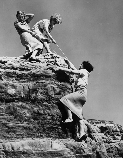 Holidaymakers in 1938 on a trip to Hastings, East Sussex, enjoy rock-climbing in attire more suited to the office Rock Climbing Women, British Holidays, Hastings East Sussex, A Level Photography, Rock Climbers, 100 Years Ago, Vintage Rock, Great British, East Sussex