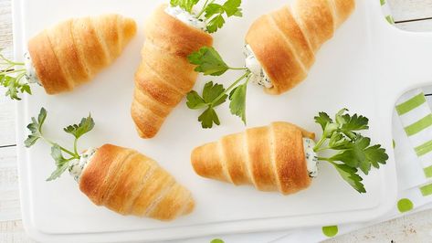 These carrot crescents are filled with a flavorful herbed cream cheese for the perfect springtime side dish. Carrot Shaped Crescent Rolls, Stuffed Crescent Roll Carrots, Pillsbury Rolls, Hosting Easter, Easy Easter Brunch, Appetizers Cheese, Pillsbury Crescent, Cream Cheese Crescent Rolls, Easter Appetizers