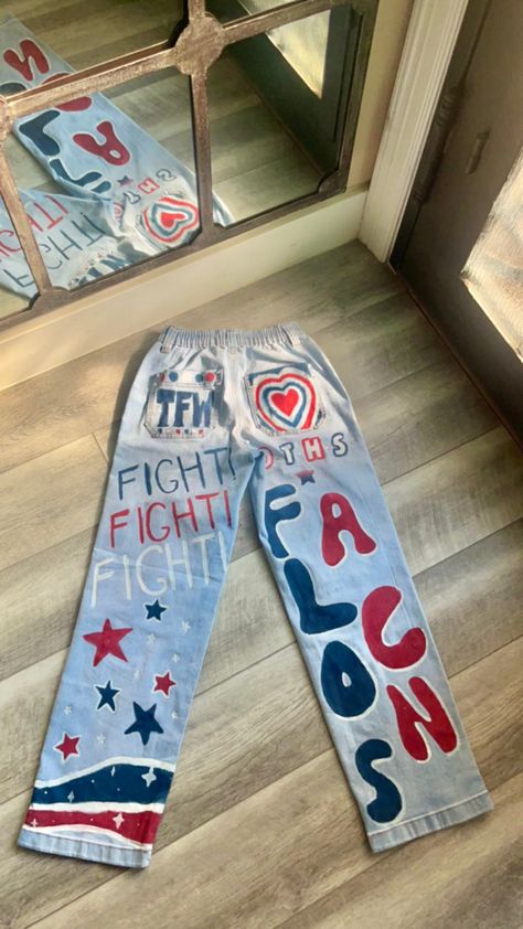 #senior #senioryear #seniorszn #hoco #homecoming #painting #paintedjeans #seniorjeans #highschool #classof2024 #football #footballgameoutfit Painted Jeans School Spirit Football, Hoco Pants Ideas Freshman, Spirt Jeans, Homecoming Jeans Painted, Painted Jeans School Spirit, Hoco Jeans Painted, Hoco Pants, Homecoming Jeans Ideas, Homecoming Jeans