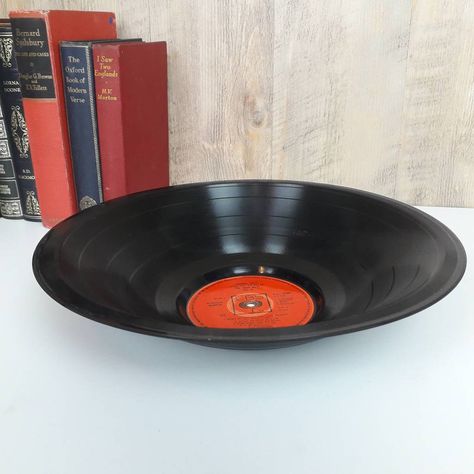 A real smooth Vinyl Record made from real classic records. Perfect for the music lover in your life.Choose from our popular artists from the drop down lists.If you do not see your favourite we may have it in stock or can buy in records for you. Both labels are laminated to protect and add shine to the labels.All bowls will be 100% original vinyl with great labels on both sides. Any replica labels will be stated along side the listed album artist title.We also can make labels for you to resemble any album or artist or a song for both sides of the record. This could be a replica of an actual real label or one for song that was never available on vinyl.We can also print your photos on the labels - please ask. OTHERS AVAILABLE: TOO MANY TO LIST PLEASE ASK IF YOU DO NOT SEE YOUR CHOICE ON THIS Vinyl Record Projects, Make Labels, Vinyl Record Bowl, Champagne Roses, Vinyl Record Crafts, Record Bowl, Record Crafts, Record Bowls, How To Make Labels