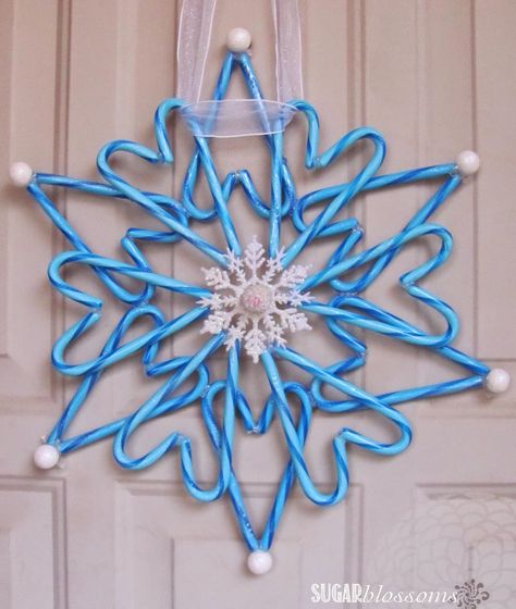 Today I'm sharing a quick and easy Christmas craft that looks fabulous!   DIY CANDY CANE WREATH   My friend Vicki introduced me to the fini... Candy Cane Crafts, Candy Cane Decorations, Snowflake Wreath, Hanger Crafts, Candy Cane Wreath, Candy Crafts, Simple Craft, Frozen Inspired, Easy Christmas Crafts