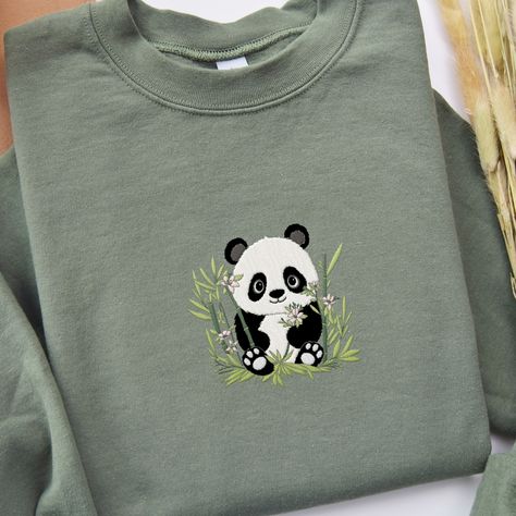 𝑬𝒎𝒃𝒓𝒐𝒊𝒅𝒆𝒓𝒆𝒅 𝑷𝒂𝒏𝒅𝒂 𝒔𝒘𝒆𝒂𝒕𝒔𝒉𝒊𝒓𝒕 🐼 🐼 This adorable and whimsical panda Sweatshirt is a great addition to your all season wardrobe, especially in spring! 🌼 It's prefect for taking a walk, running errands, chilling at home, or hanging out with friends! Our crewnecks are made from the highest quality fabric for an incredibly soft and comfortable fit. You can find the sweater in my Etsy Shop 🤍 👉🏻 link in Bio #embroiderydesigns #embroideredart #embroidery #sweatshirtforwomen #embroidered #embroider... Panda Embroidery, Panda Sweater, Hanging Out With Friends, Chilling At Home, Panda Shirt, Out With Friends, Kawaii Panda, Taking A Walk, Embroidered Art