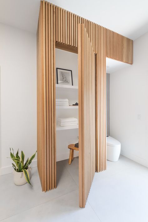 Master Bathroom Hidden Closet Door Sliding Ensuite Door, Slat Cupboard Doors, Hidden Door Bathroom, Wood Shower Door Ideas, Slat Closet Doors, Scandi Shower Room, Hidding Door, Wood Slat Hidden Door, Hidden Closet Ideas