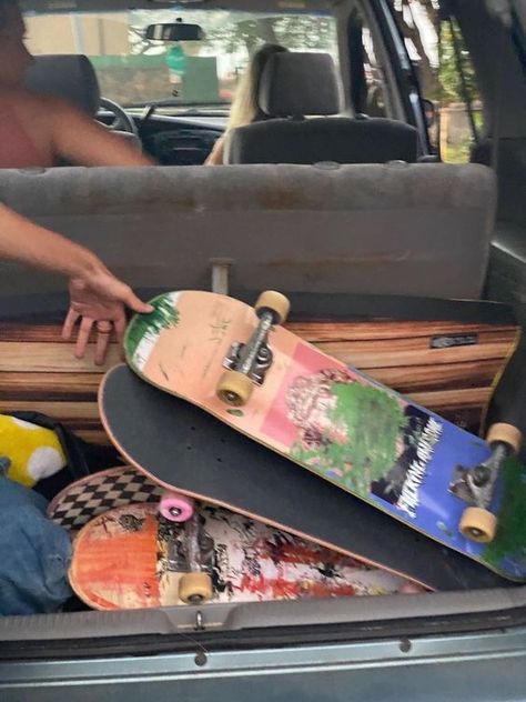 A Car, The Back, A Man, Skateboard