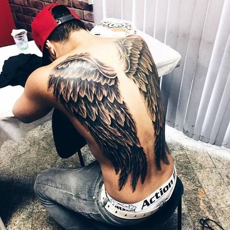 Discover the Art of Wings Men Tattoo Designs 2024: Trends & Styles Back Wings Tattoo, Angel Wings Tattoo On Back, Cross With Wings Tattoo, Tattoos On Back, Wing Tattoos On Back, Alas Tattoo, Wing Tattoo Men, Wing Tattoos, Side Neck Tattoo