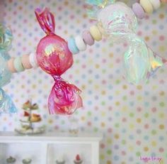 how to make giant candy props - Google Search Candy Hanging From Ceiling, Candy Garland Diy, Diy Candy Garland, Candy Garland, Christmas Candyland, Candy Props, Candyland Theme, Candy Decorations Diy, Candy Decor