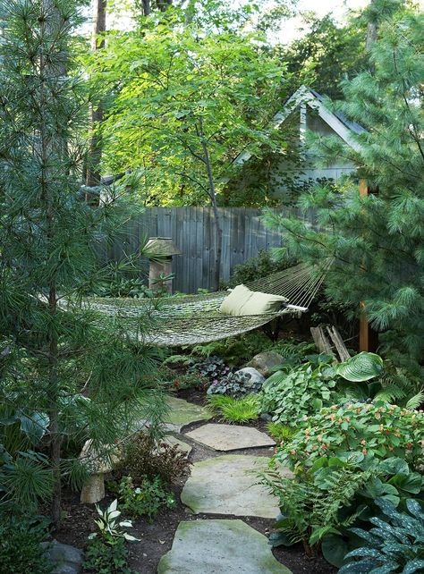 If you don't want to work on making your entire yard a private paradise, take one corner and transform it into a secluded getaway. #outdoorideas #patioideas #outdoortrends #backyardprivacy #bhg Courtyard Decor, Shade Garden Design, Urban Backyard, Backyard Hammock, Privacy Trees, Yard Landscape, Sloped Garden, Small Backyard Gardens, Garden Wallpaper