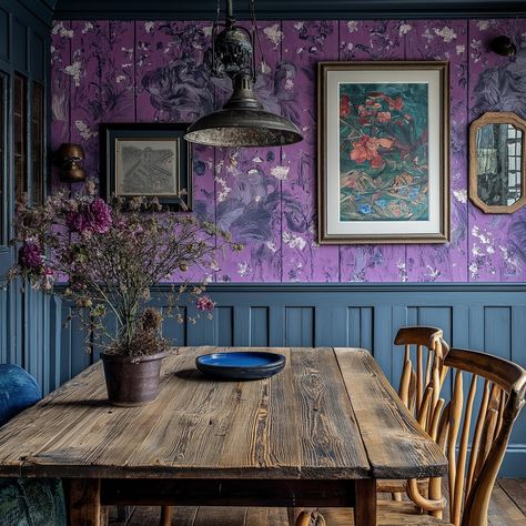 Dining in a floral haven 🌸🍽️. Bold wallpaper and natural wood elements bring warmth and charm to this rustic dining room—perfect for fall gatherings. #RusticDiningRoom #FallDecor #FloralWalls #CottagecoreDining Dark Cottagecore Dining Room, Cottagecore Dining Room, Purple Dining, Purple Dining Room, Fall Gathering, Rustic Dining Room, Bold Wallpaper, Dark Cottagecore, Rustic Dining