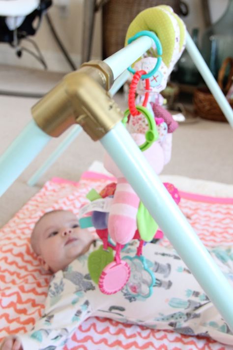 DIY Baby Activity Gym | Home On Oak Diy Baby Gym, Baby Gym Mat, Baby Activity Gym, Baby Gym Toys, Pvc Pipe Projects, Diy Gym, Gym Mat, Baby Toys Diy, Pvc Projects