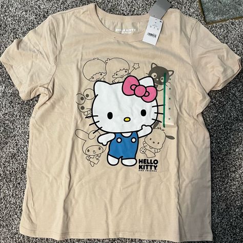 This Listing Is For A Ladies Short Sleeve T-Shirt. Beige Background. Size Medium. Nwt. Sanrio Shirt, Sanrio Clothes, Hello Kitty Shirt, Hello Kitty T Shirt, Hello Kitty Merchandise, Kitty Clothes, Hello Kitty Clothes, Cute Outfits With Jeans, Cute Pajama Sets