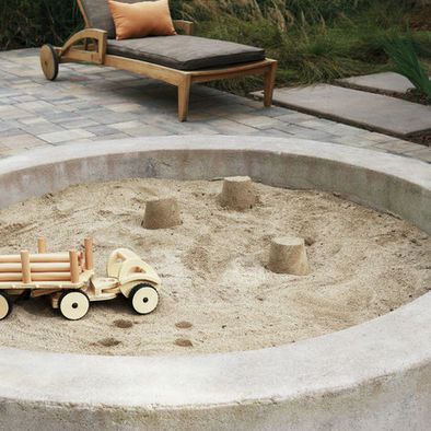 sandbox. I love that it is concrete.  No slivers, no rot. Sand Pits For Kids, Backyard Sandbox, Modern Patio Design, Sand Pit, Play Garden, Contemporary Patio, Sand Play, Natural Playground, Backyard Playground